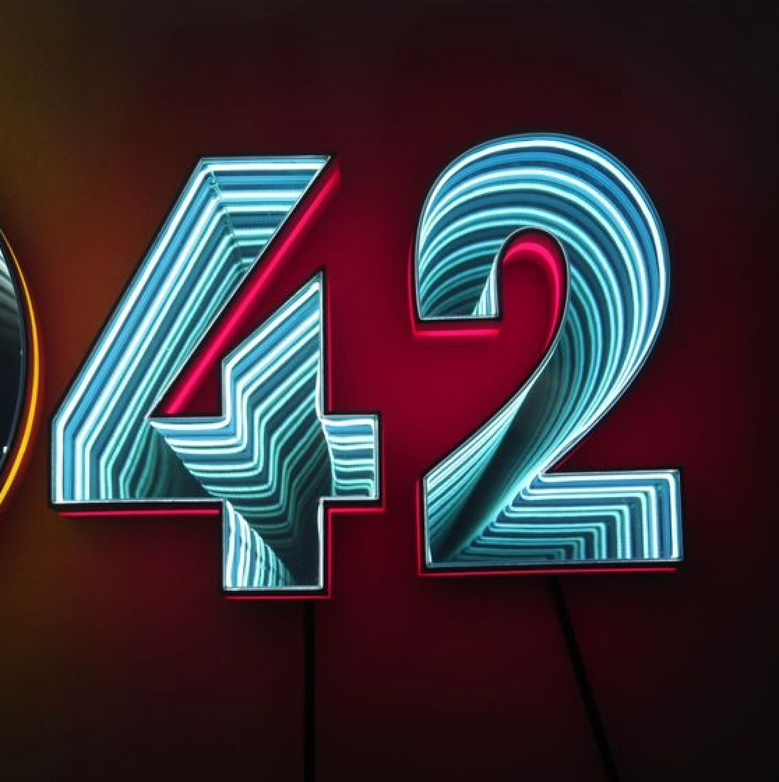 3D infinity letter sign with LED endless tunnel lighting effect
