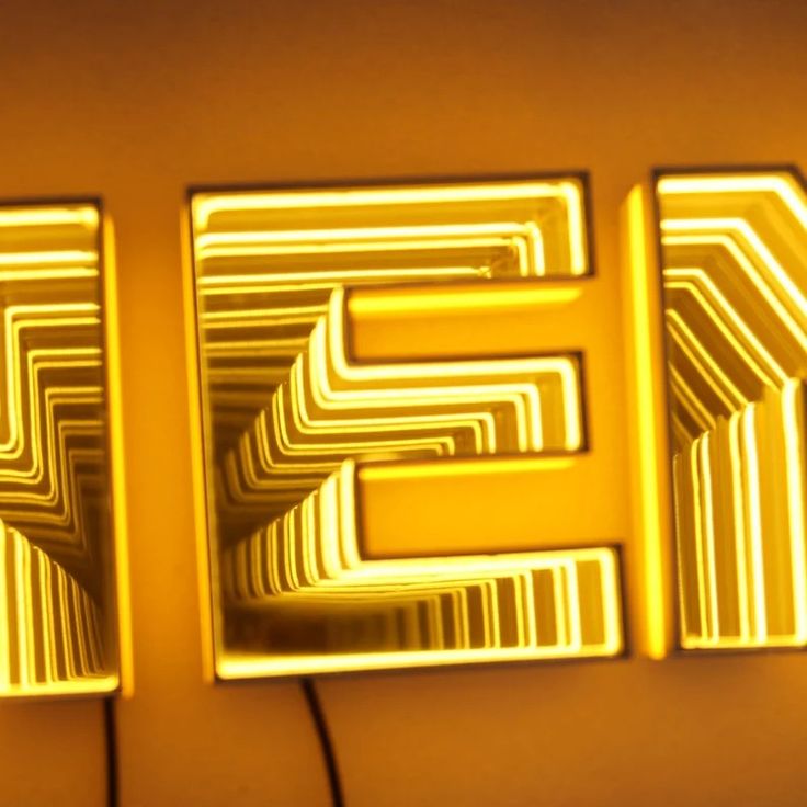 3D infinity letter sign with LED endless tunnel lighting effect